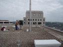 Here\'s how one flagpole was supported on the roof.