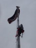The flag had been up there for more than a week. What a tanggled mess, What a wind load too... ride the rodeo