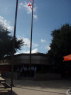 The pole at LaFlore HS in Mobile AL was located in the courtyard and brought in JHH to to the climb. After 3 yrs...... O\'glory and state flag flies again. 